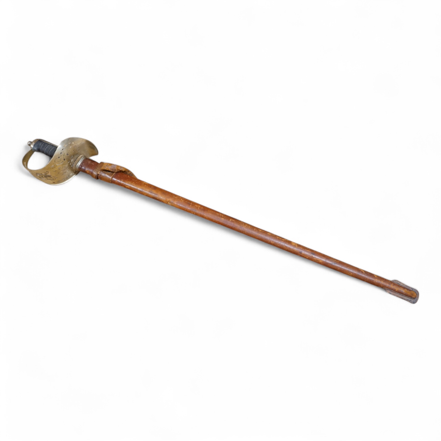 A George V 1897 pattern infantry officer’s sword, with regulation blade etched with the union flowers, Royal Arms and owners name; J.W. Reynolds, Dorrington, Lincoln, regulation nickel guard stamped ‘WH&S’ in minuscules,